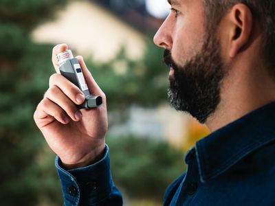 Profile of a man breathing deeply before an exercise.